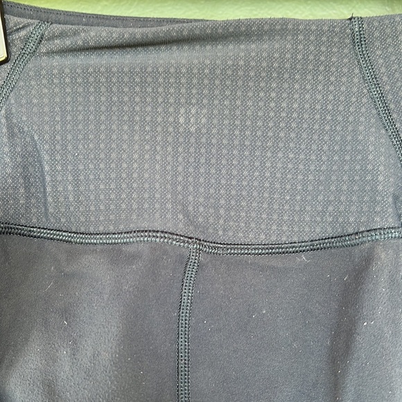 Lululemon Leggings. Size 2. Fixed hole in mesh panel (pictured). Navy Blue. - Picture 5 of 8